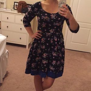 Knee-length black floral dress